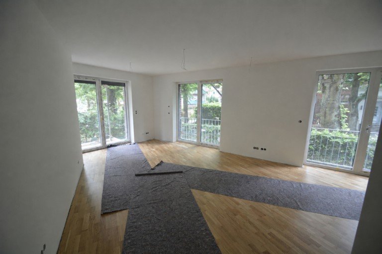Wohnzimmer mit offener K�che Hamburg - Marienthal (Stadtteil) Erdgeschosswohnung Erdgeschosswohnung mit Balkon - Komfortabler Neubau-Erstbezug