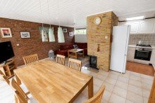 Wohn- und Esszimmer Ferienbungalow in Scharbeutz - 
nur 200 Meter zum Ostsee-Strand!